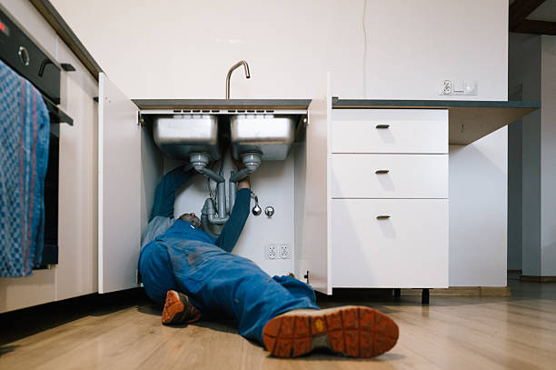 Professional Emergency Plumber technician working in Watauga, TX